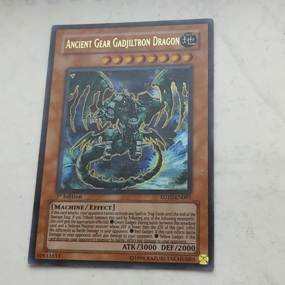 Yu-Gi-Oh! - Ancient Gear Gadjiltron Dragon (SD10-EN001) holo card 1st edition - Picture 1 of 3